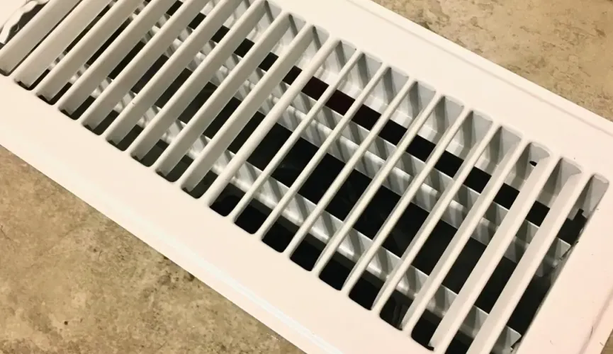 HVAC air vents inspection in West Palm Beach FL home showing AC odor issue Palm Beach County Florida