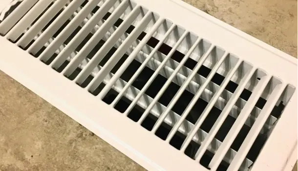 HVAC air vents inspection in West Palm Beach FL home showing AC odor issue Palm Beach County Florida